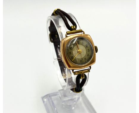 A 1930's 9ct gold ladies watch on leather strap, 12.6g, in going order. Estimate: £50-80