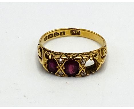 18ct gold diamond and ruby ring, one stone missing, 4.3g. Estimate: £170-200