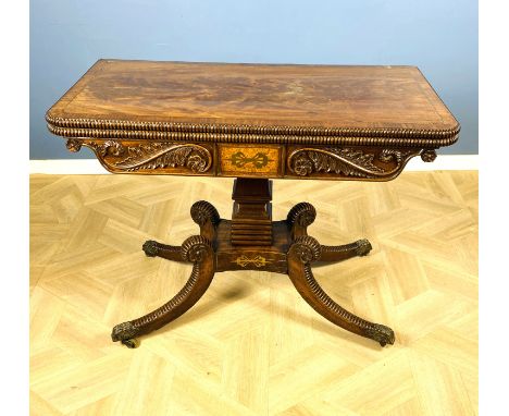 In the manner of William Trotter, Edinburgh. A good early 19th century rosewood and brass inlaid card table with a beaded top