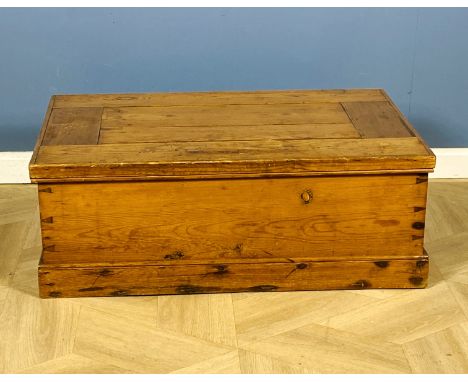 A 19th century stripped and waxed pine small trunk / box, 71cms wide x 46cms deep x 25cms high. Estimate £20-40.