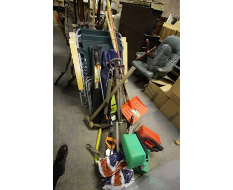 Three plastic fuel cans, snow shovel, hand tools, etc.