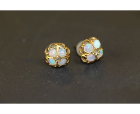 Pair of yellow metal, opal &amp; diamond chip earrings