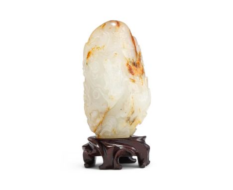 A small Chinese white and russet 'scholars' jade boulder carving, 18th or 19th century, one side with a scholar sitting under