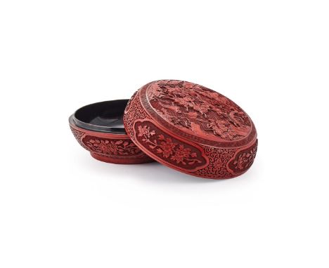 A large Chinese cinnabar lacquer circular box and cover, late 18th or 19th century, the cover carved in relief with warriors 