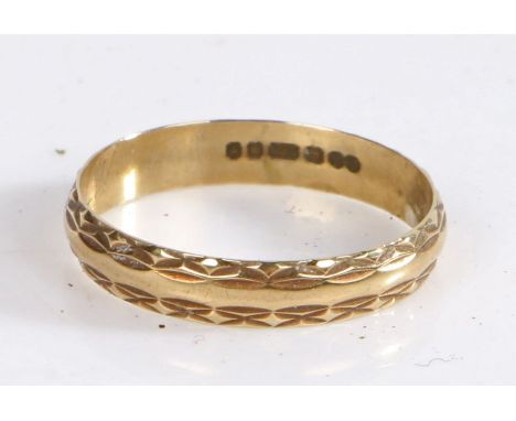 9 Carat Gold Wedding Band, with a repeating pattern to the rim, ring size Q weight 1.2 grams&nbsp; &nbsp;