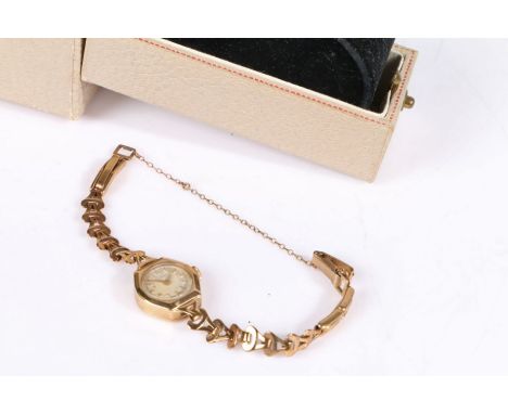 Rotary 9 carat gold ladies wristwatch, the signed cream dial with Arabic markers, manual wound, the case 16.5mm wide, on a 9 