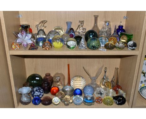 A LARGE QUANTITY OF GLASS PAPERWEIGHTS AND GLASS ORNAMENTS, comprising a 1920's Uranium glass table clock 7.5cm x 7.5cm (chip