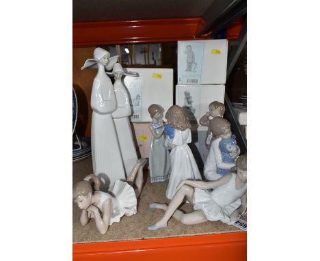 A GROUP OF SEVEN NAO FIGURES AND ONE LLADRO FIGURE, comprising Lladro Two Nuns model no 4611 design by Fulgencio Garcia, two 