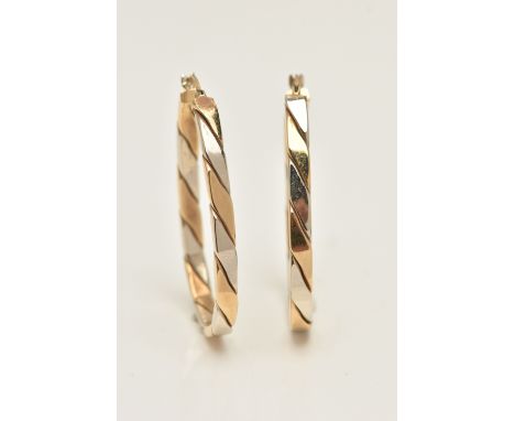 A PAIR OF 9CT BI-COLOUR HOOP EARRINGS, oval hoops with alternating yellow and white gold, lever post fittings hallmarked 9ct 
