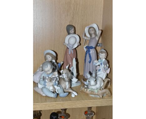 A GROUP OF SIX LLADRO FIGURES AND ONE NAO FIGURE, comprising Trying on a Straw Hat, model no 5011, sculptor Francisco Catala 