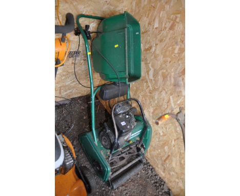 A QUALCAST CLASSIC PETROL 35s PETROL CYLINDER MOWER with grass box (engine pulls freely but hasn't been started)