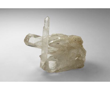 An unusually fine cluster of quartz crystals from Rio Grande do Sul, Brazil, with several large crystals and one long prismat