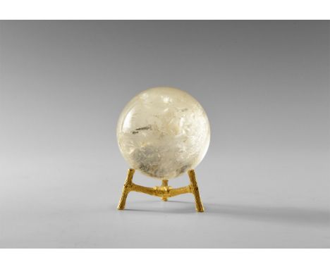 A sphere of rock crystal quartz with numerous internal features producing a rainbow effect, with stand. From the historic ‘Vi