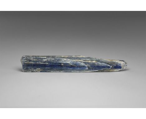 A large single blade of kyanite composed of a number of parallel-growth blades, from Afghanistan. Found Afghanistan; from the