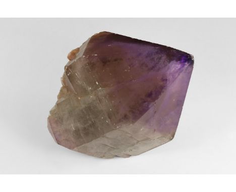 A large single amethyst crystal from a now extinct Australian deposit, with generally lighter, lilac amethyst but with the ed