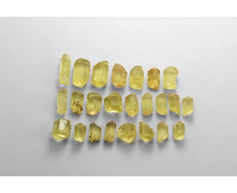 A group of 24 gem quality yellow apatite crystals from the now extinct deposit at Queretero, Mexico. Found Queretero, Mexico;