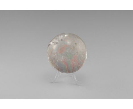 A superb sphere of rock crystal quartz with an internal feature creating colour dispersion and a broad, spectacular 'rainbow'