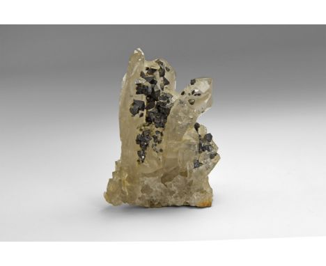 A rare specimen consisting of numerous finely-crystallised anatase crystals encrusting a group of quartz crystals, from Norwa