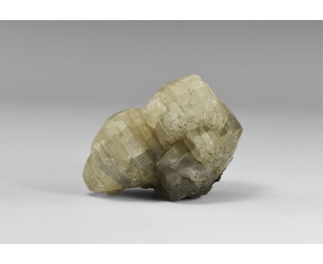 A specimen of parallel growth cerussite crystals from Cumbria, UK, in white card tray with Gregory, Bottley and Lloyd label r