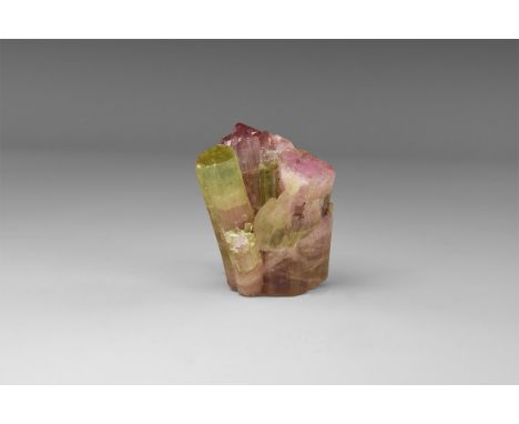 A fine tourmaline specimen with crystals of pink and green tourmaline from Tilgit, Pakistan, the pink with unusual full termi