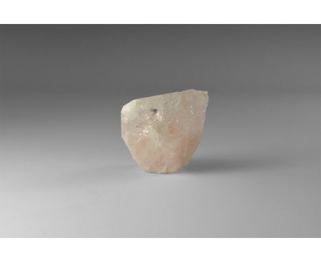 A single crystal of danburite from Mexico, with lustrous faces and full termination, slight pink colour, in old white card tr