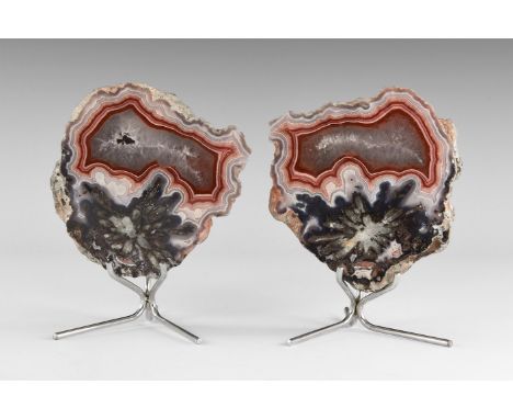 A exceptionally fine pair of polished Malawi agate nodule halves, with natural colour banding, and with an unusual radiating,