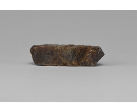 A classic double terminated, tetragonal, brown zircon crystal with lustrous faces, in old white card tray with old Gregory, B