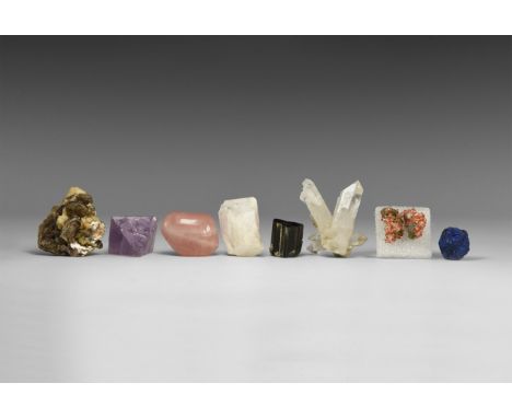 A group of eight collectable mineral specimens including: native copper, azurite, danburite, rose quartz, muscovite, tourmali