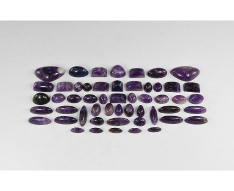 A group of fifty two amethyst cabochons of varying shapes, all cut with high domes. From the historic ‘Victorian Museum’ coll