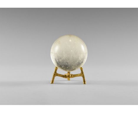 A sphere of rock crystal quartz with internal features producing a rainbow effect, with stand. From the historic ‘Victorian M