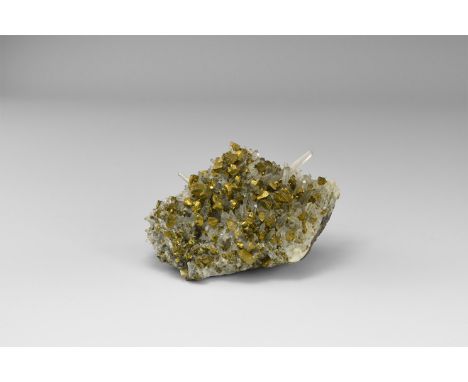 A superb specimen of chalcopyrite with accompanying acicular quartz crystals from Peru, in old white card tray with old Grego