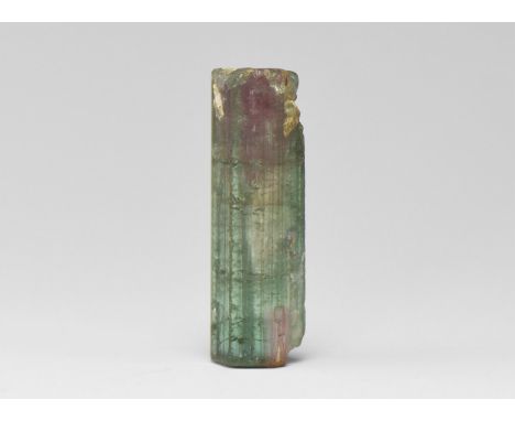 A finely crystallised green tourmaline from Brazil, with overgrowth on pinacoidal termination and a red centre to the base, i