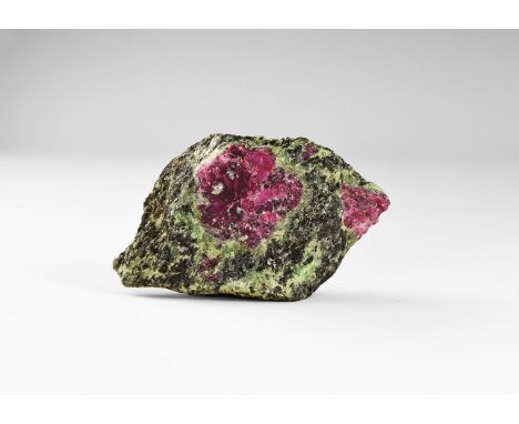 A specimen of ruby in zoisite from Zaire, in old white card tray. From Zaire; from the historic ‘Victorian Museum’ collection