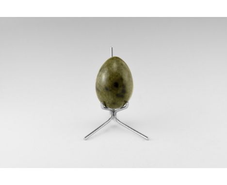 A gemstone egg carved in green serpentine, with spots of another black mineral, with stand. From the historic ‘Victorian Muse
