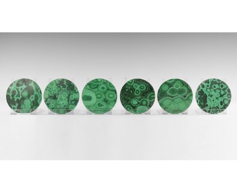 A group of six circular malachite coasters, averaging 4mm in thickness, all with numerous 'bullseye' patterns, un-backed. Fro