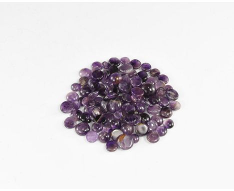 A group of one hundred amethyst cabochons, tumbler finished with rounded girdles, polished on all sides. From the historic ‘V