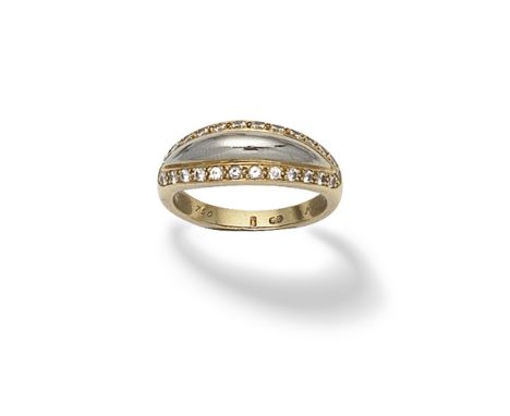 CARTIER: BICOLOURED DIAMOND-SET RINGOf reeded design, mounted in 18 carat yellow and white gold,  signed Cartier, numbered, S