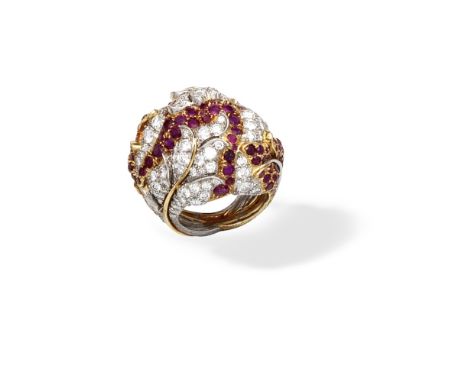 RUBY AND DIAMOND BOMBÉ DRESS RINGOf openwork foliate design, the bi-coloured leaves set with circular-cut rubies and brillian