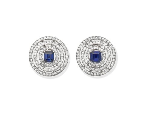 GRAFF: SAPPHIRE AND DIAMOND 'BULLSEYE' EARRINGSEach with a central step-cut sapphire, weighing 2.25 carats total, within surr