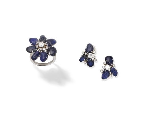 SAPPHIRE AND DIAMOND-SET FLORAL CLUSTER RING AND EARCLIP SUITEThe carved sapphire petals surrounding a central brilliant-cut 