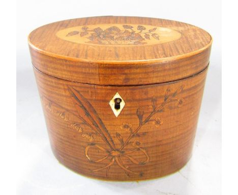 A late 18th century oval floral marquetry tea caddy, with working lock and key, 12cm h x 14.5cm w. Key in end cabinet. 