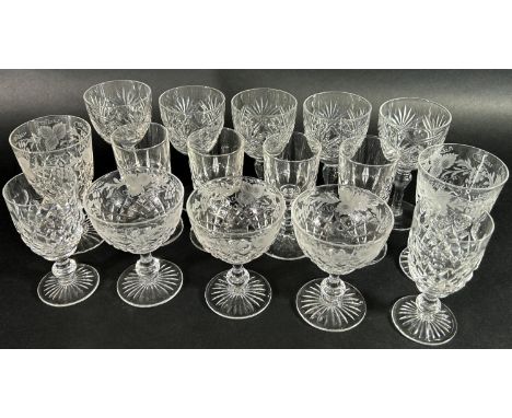 A mixed selection of clear cut glass, including four boxed Galway Irish Crystal wine glasses, brandy goblets, and a mixers va