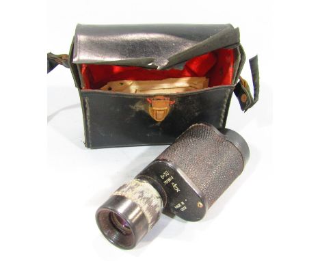 A Soviet Union era monocular, made in USSR, with its original certificate and serial No 7519814, dated 1975, with its origina