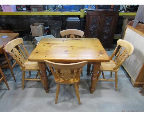 A small pale pine kitchen table with, 78cm high, 104 x 78cm together with four Windsor kitchen dining chairs (5) 