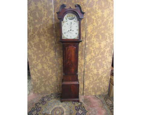 A Georgian mahogany longcase clock, the hood with swan neck pediment enclosing a broken arched painted dial with subsidiary c