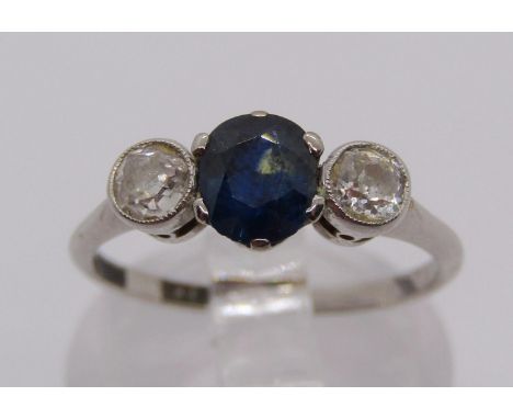 Early 20th century 18ct white gold three stone sapphire and diamond ring, diamonds 0.15ct each approx, size K, 2.3g 