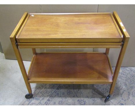 A mid 20th century Macintosh teak extending dining table (160 x 92cm, closed) together with six associated dining chairs  and