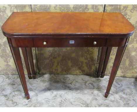 A Multi York D end fold over top tea table with frieze drawer on square taper legs with spade feet 