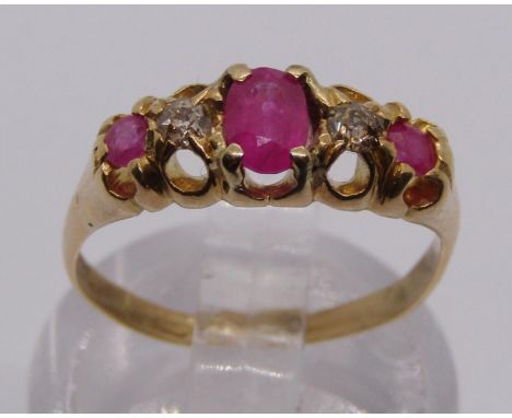18ct ruby and diamond ring, size I, 2.4g (two rubies slightly loose in setting) 