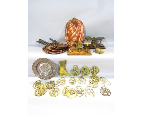 Two postal scales with some weights, a set of six graduated saucepan lids, a quantity of brass horse brasses, a copper jelly 